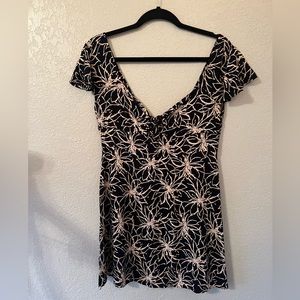 MINI FLORAL DRESS WITH PEEP HOLE!